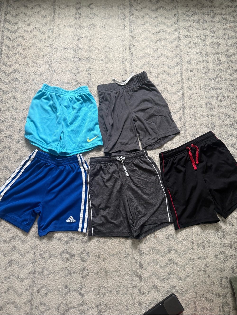 5 pairs of Boys shorts. Size 5. Nike, adidas, jumping beans. Like new.